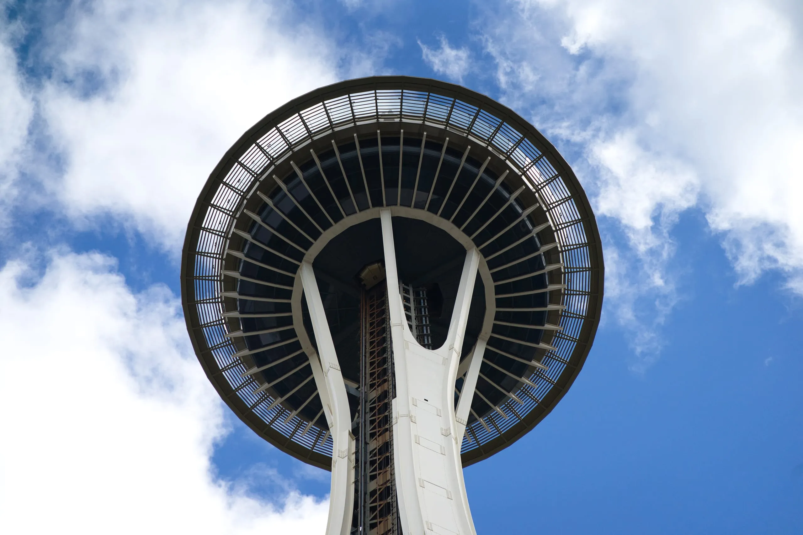 Graphic look directly up at the underside disc of the Space Needle in Seattle